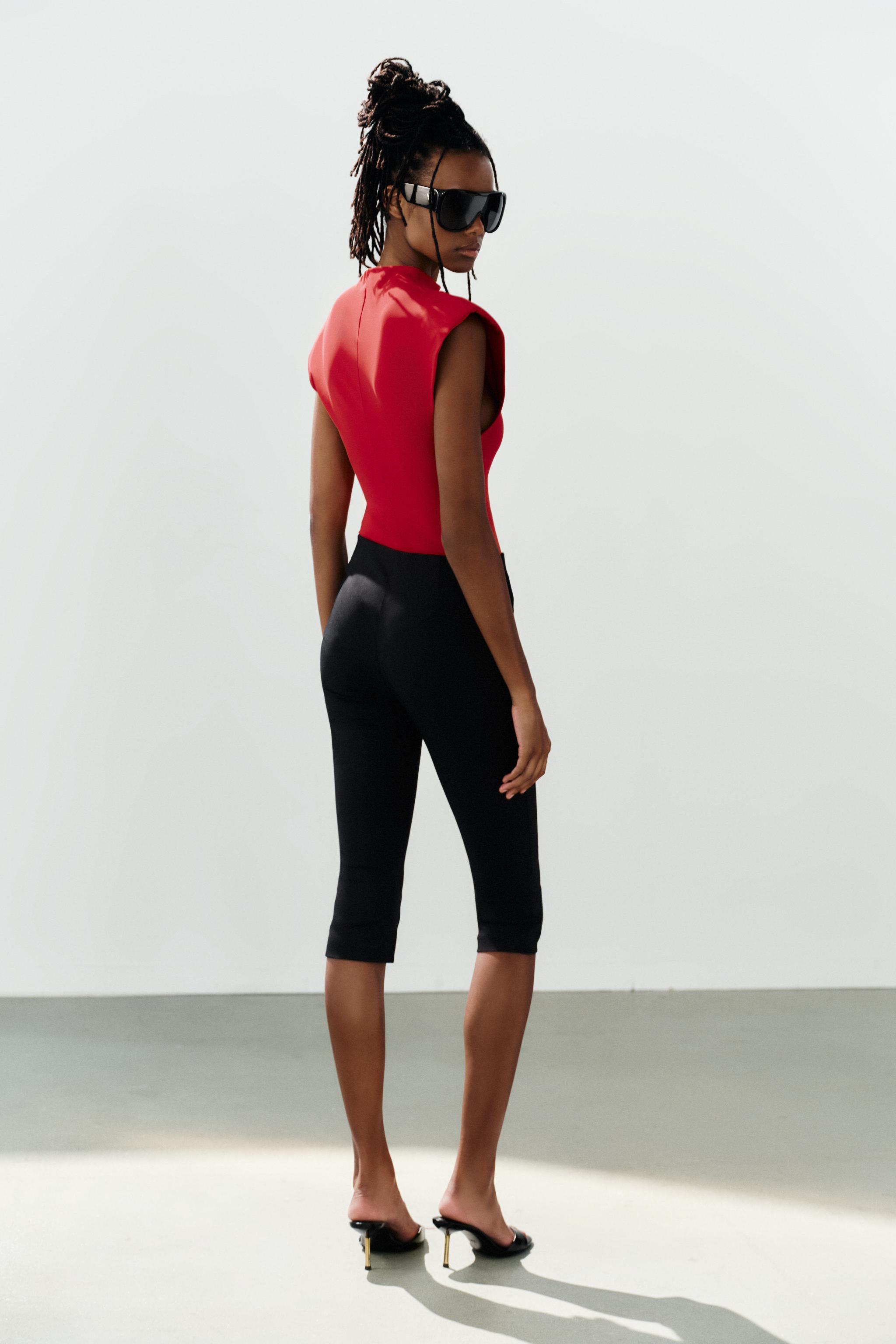 SHOULDER PAD BODYSUIT